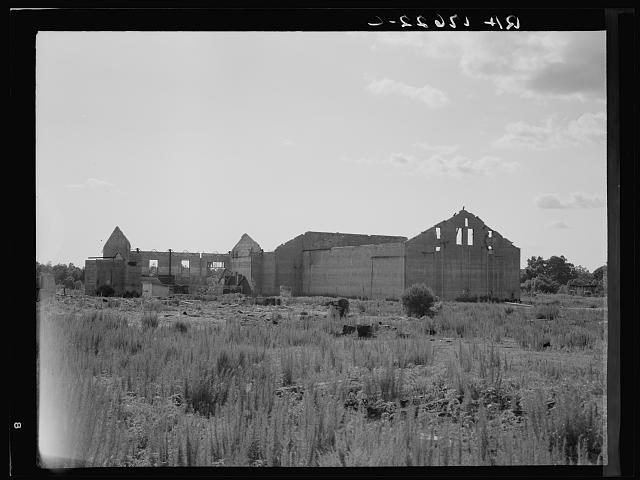 Abandoned sawmill missing its roof